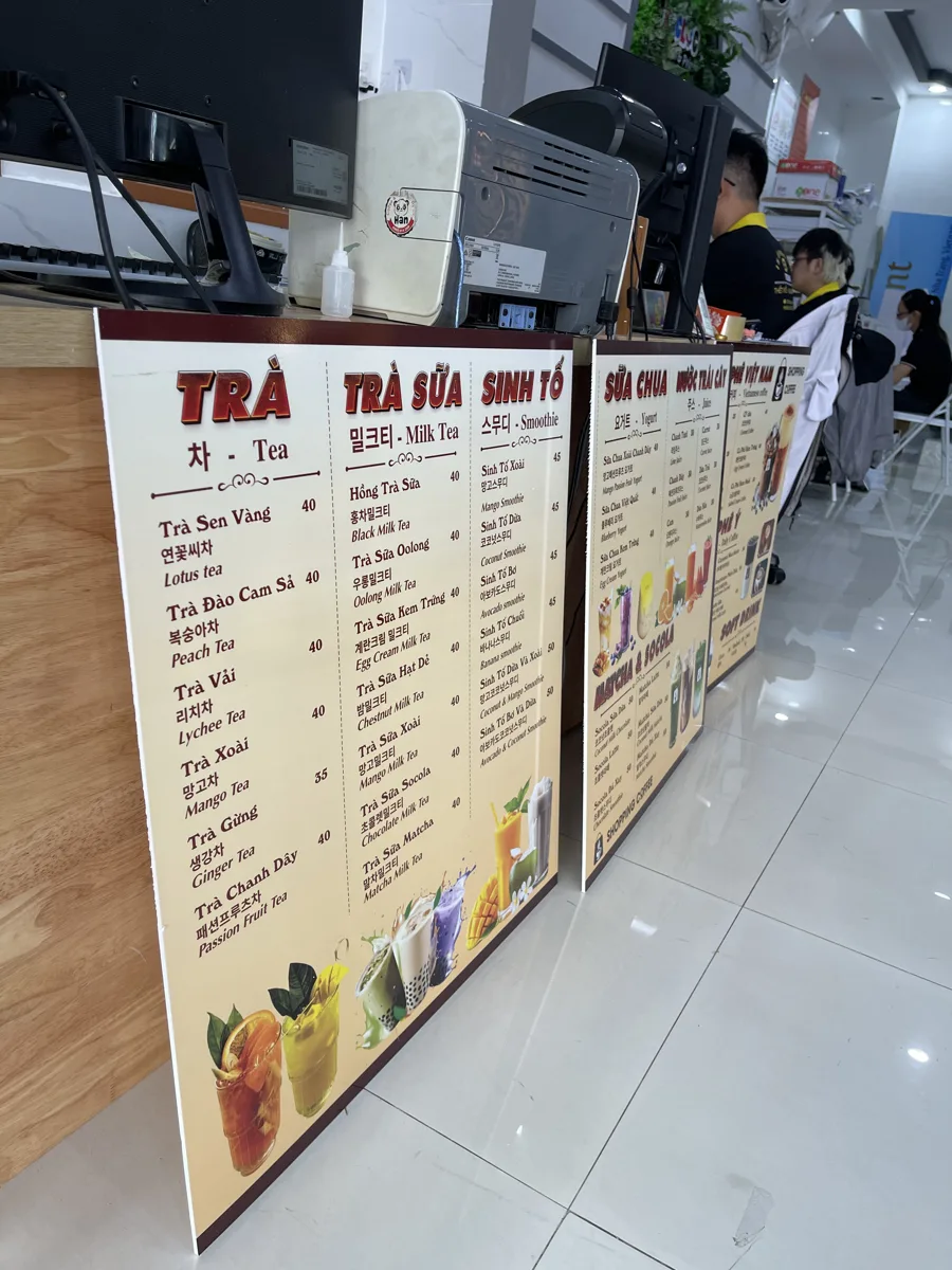 bảng menu dán tường trong quán tại Nha Trang